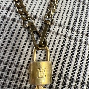 Authentic Louis Vuitton lock n key # 307